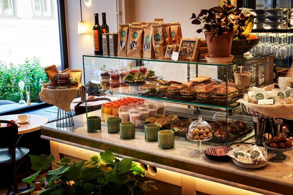 Villa Dagmar Стокгольм Ресторан фото A display of coffee and pastries at a café in Stockholm, Sweden